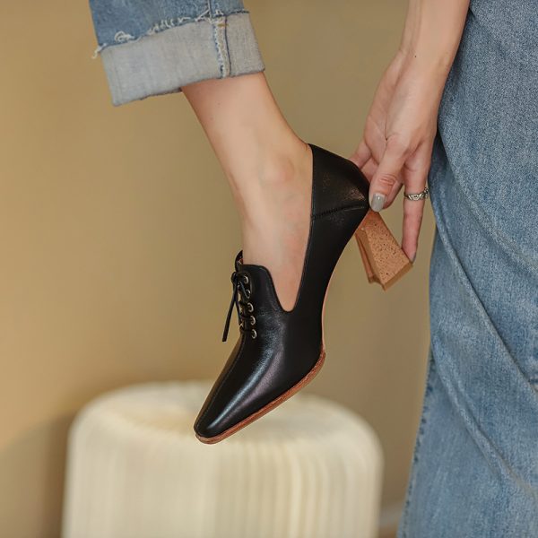 Elegant pumps med hæl i okseskinn